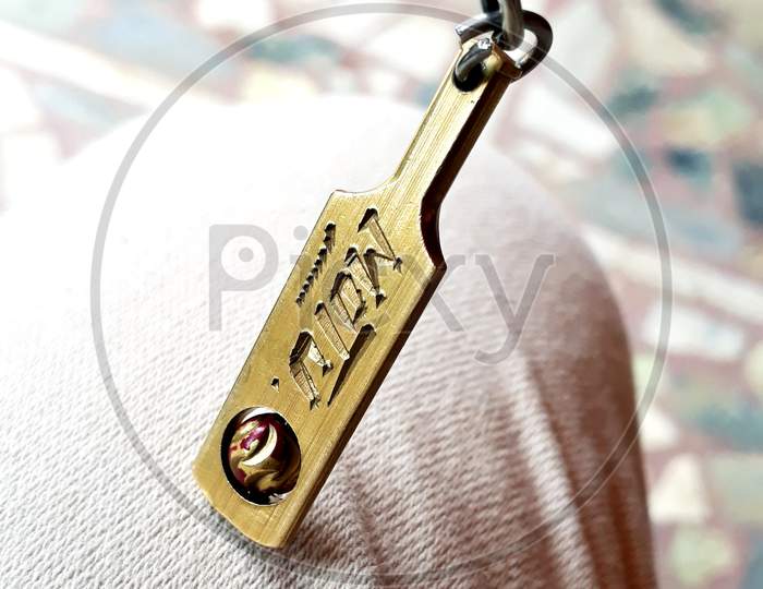 Keychain With Cricket Bat Selective Focus