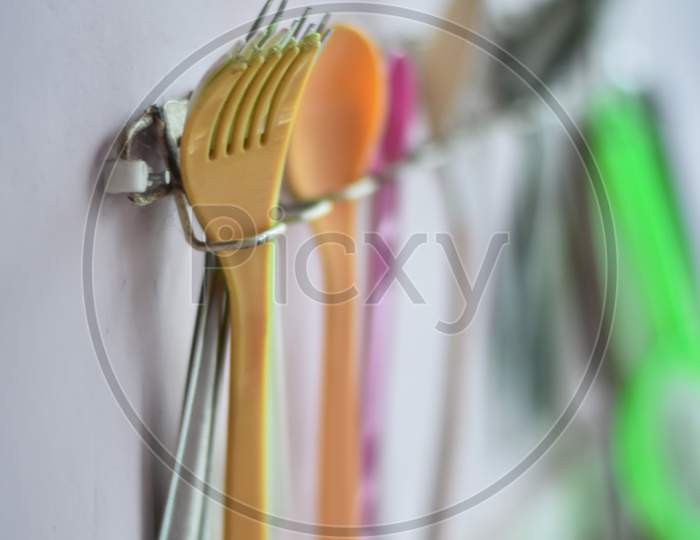 fork and knife hanging on the wall