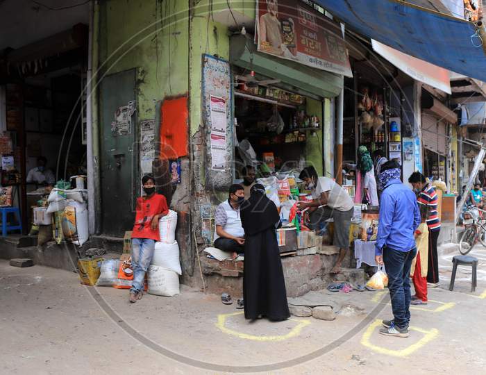 People Buying groceries At a Store during Nationwide Lockdown Amidst Coronavirus or COVID-19 Outbreak In Prayagraj