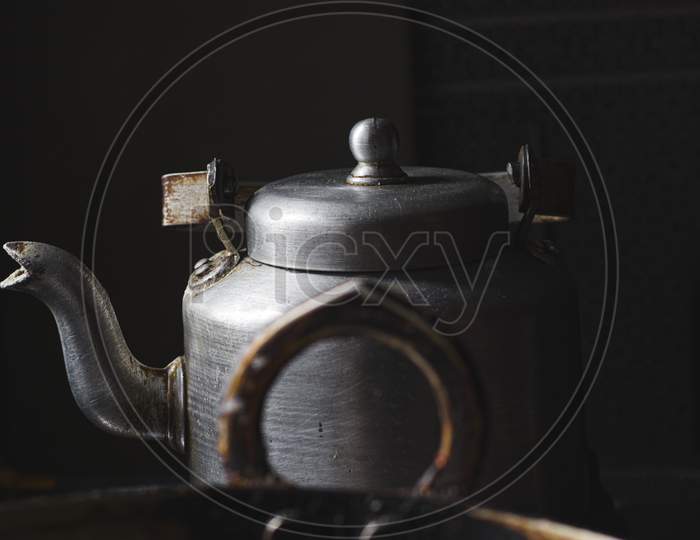 Tea Kettle or Vessel In a Kitchen
