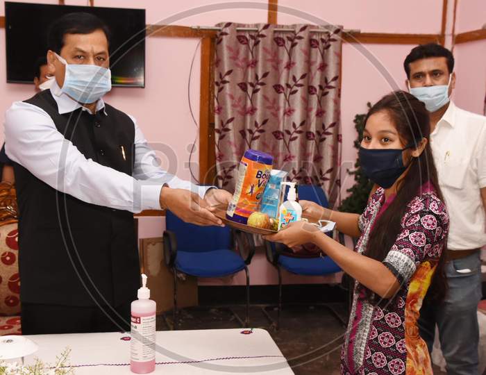 Assam Chief Minister Sarbananda Sonowal Distributing Nutritious Food Items To Inmates Of State Home For Women At Jalukbari In Guwahati On April 26,2020.