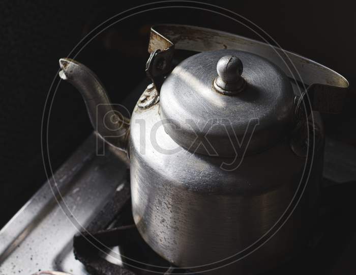 Tea Kettle or Vessel In a Kitchen