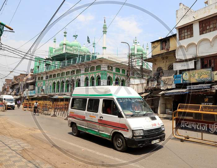 An Ambulance Near  Barricades In-front Of Jama Masjid during Nationwide Lockdown Amidst Coronavirus or COVID-19 Outbreak In Prayagraj