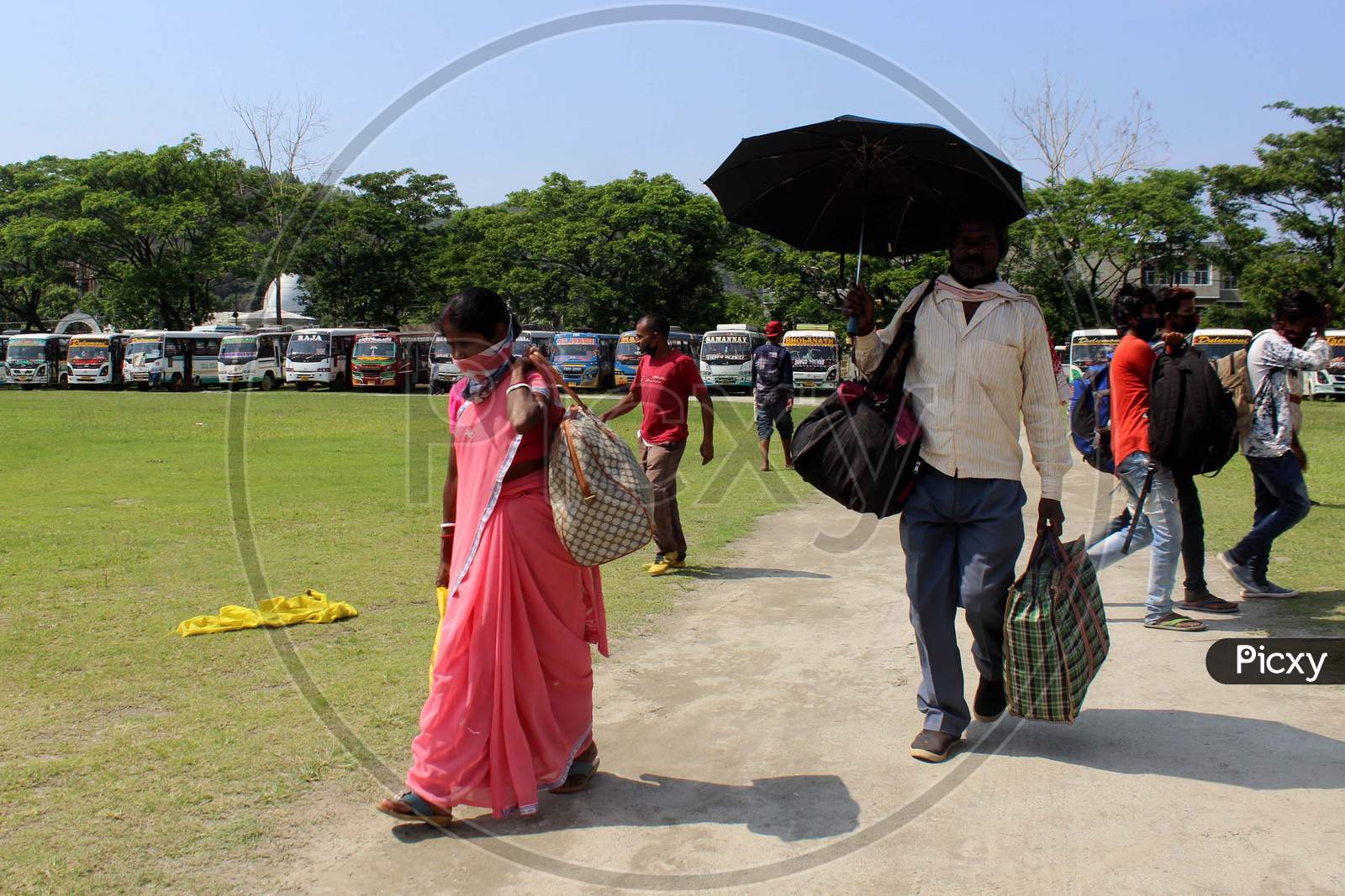 People Arrive At A.S.T.C Bus stand During Nationwide Lockdown Amidst Coronavirus Or COVID-19 Outbreak  At Amingaon In Kamrup  District Of Assam, Sunday, April 26, 2020