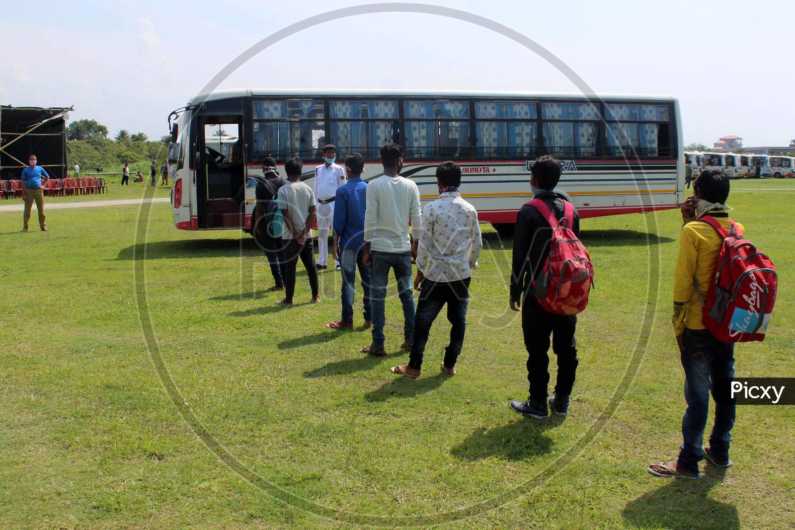 People  Boarding Buses  At A.S.T.C Bus stand During Nationwide Lockdown Amidst Coronavirus Or COVID-19 Outbreak  At Amingaon In Kamrup  District Of Assam, Sunday, April 26, 2020
