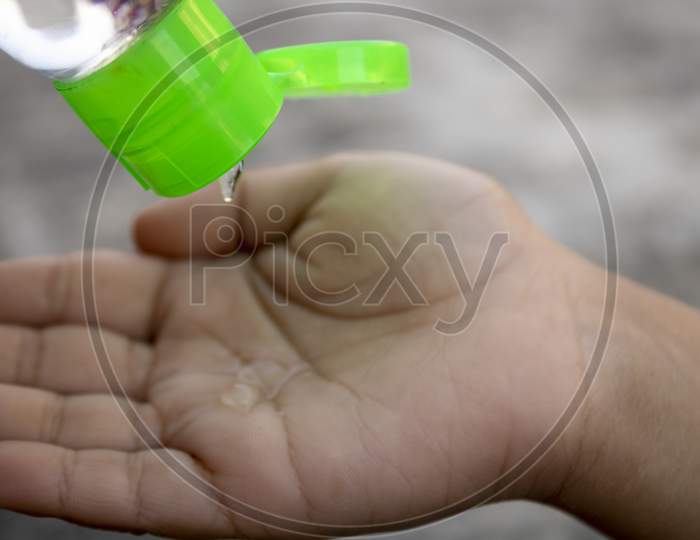 Cleaning Hand With Sanitizer For Protection From Virus