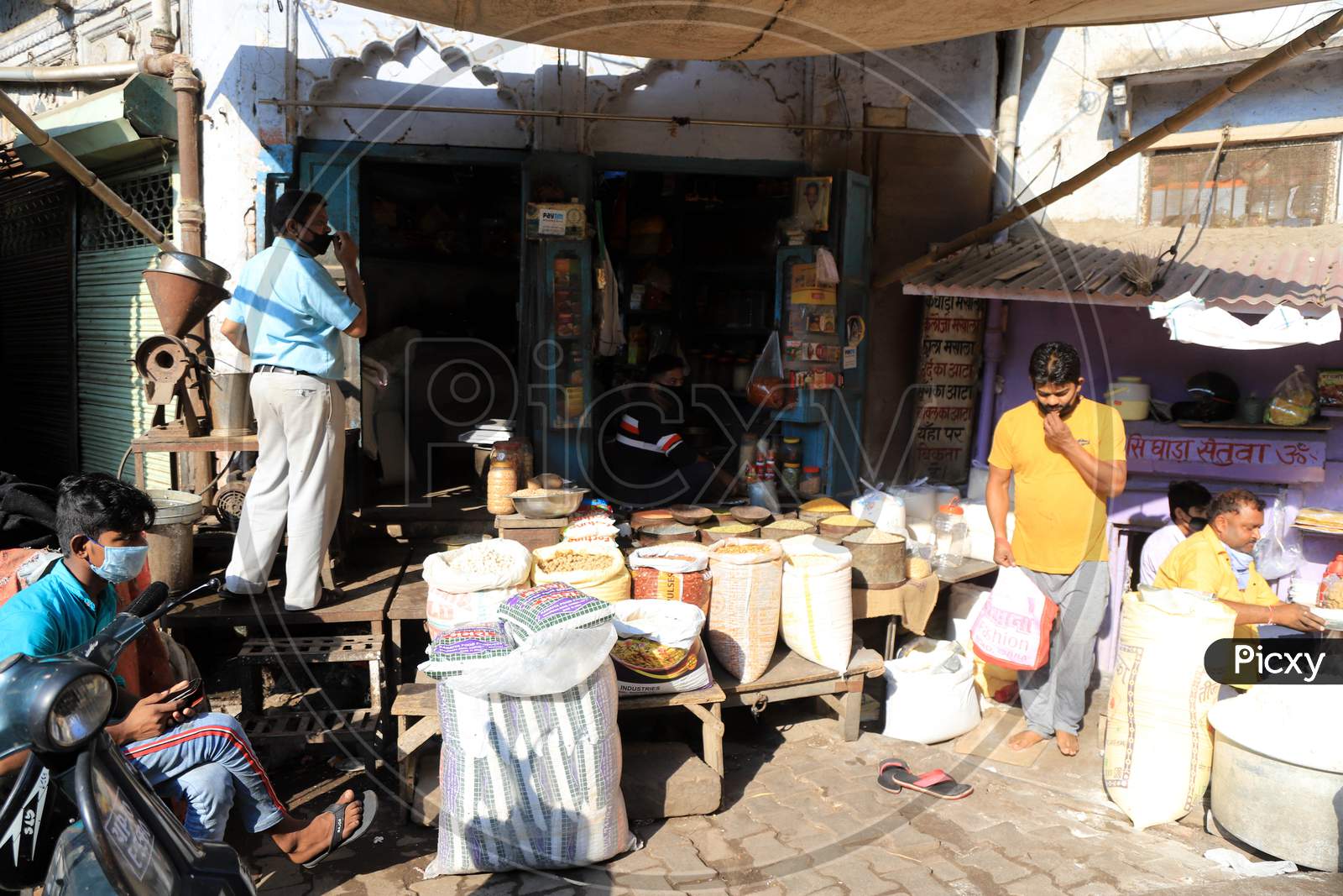 People Buy Essential Goods From Shops During Nationwide Lockdown Amidst Coronavirus Or COVID-19  Pandemic In Prayagraj April 27, 2020