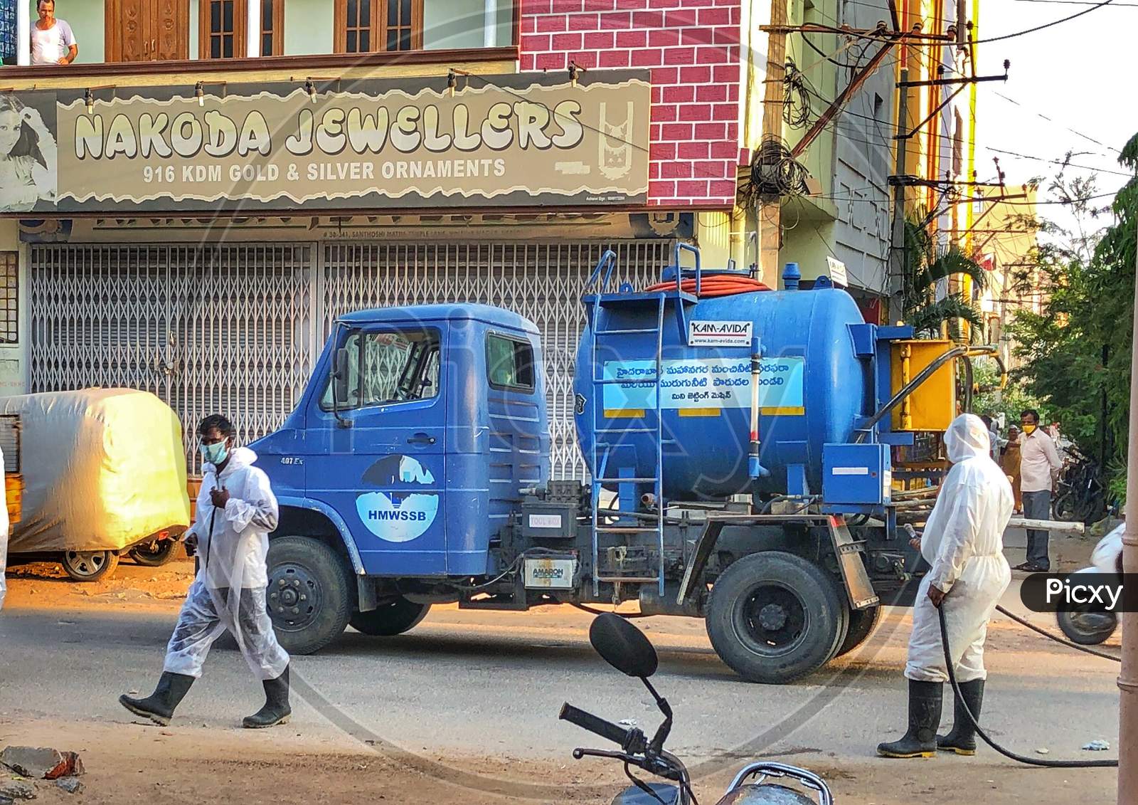 GHMC spraying disinfectants around moulali to stop the spread of coronavirus or covid 19
