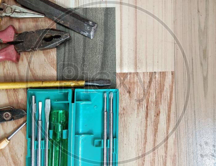 Joinery tools flat laying on wooden background texture, top view , labor day concept, copy space, selective focus on subject