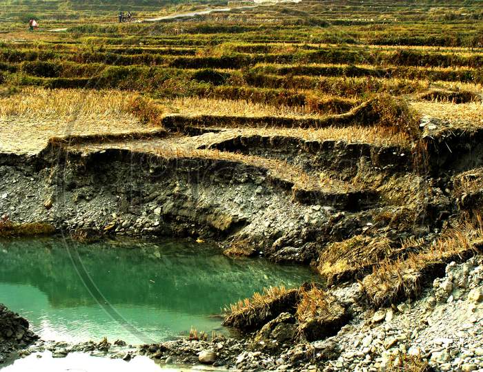 Water Inside The Big Hole Of An Agricultural Land Of Nepal, Naturally Created, Tourist Attraction