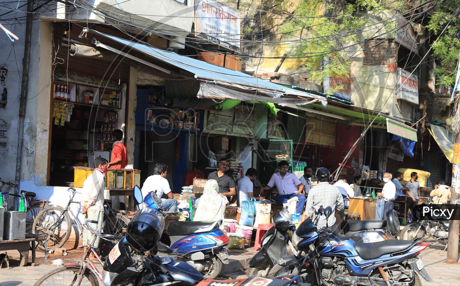 People Buy Essential Goods From Shops During Nationwide Lockdown Amidst Coronavirus Or COVID-19  Pandemic In Prayagraj April 27, 2020