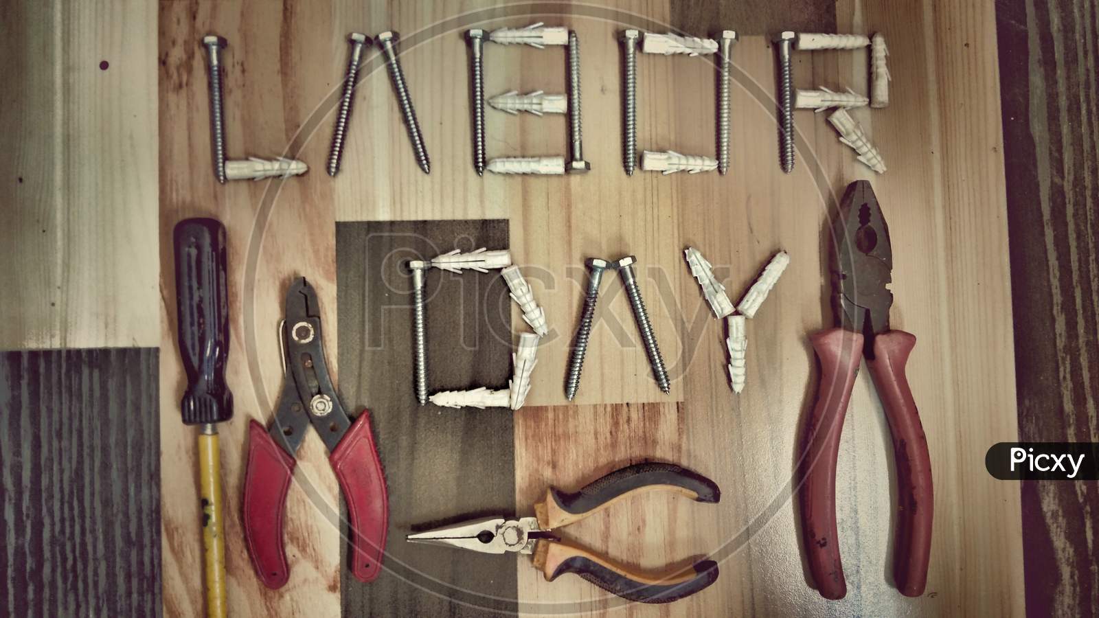 labor day with joinery tools on wooden background texture, workers day, May day