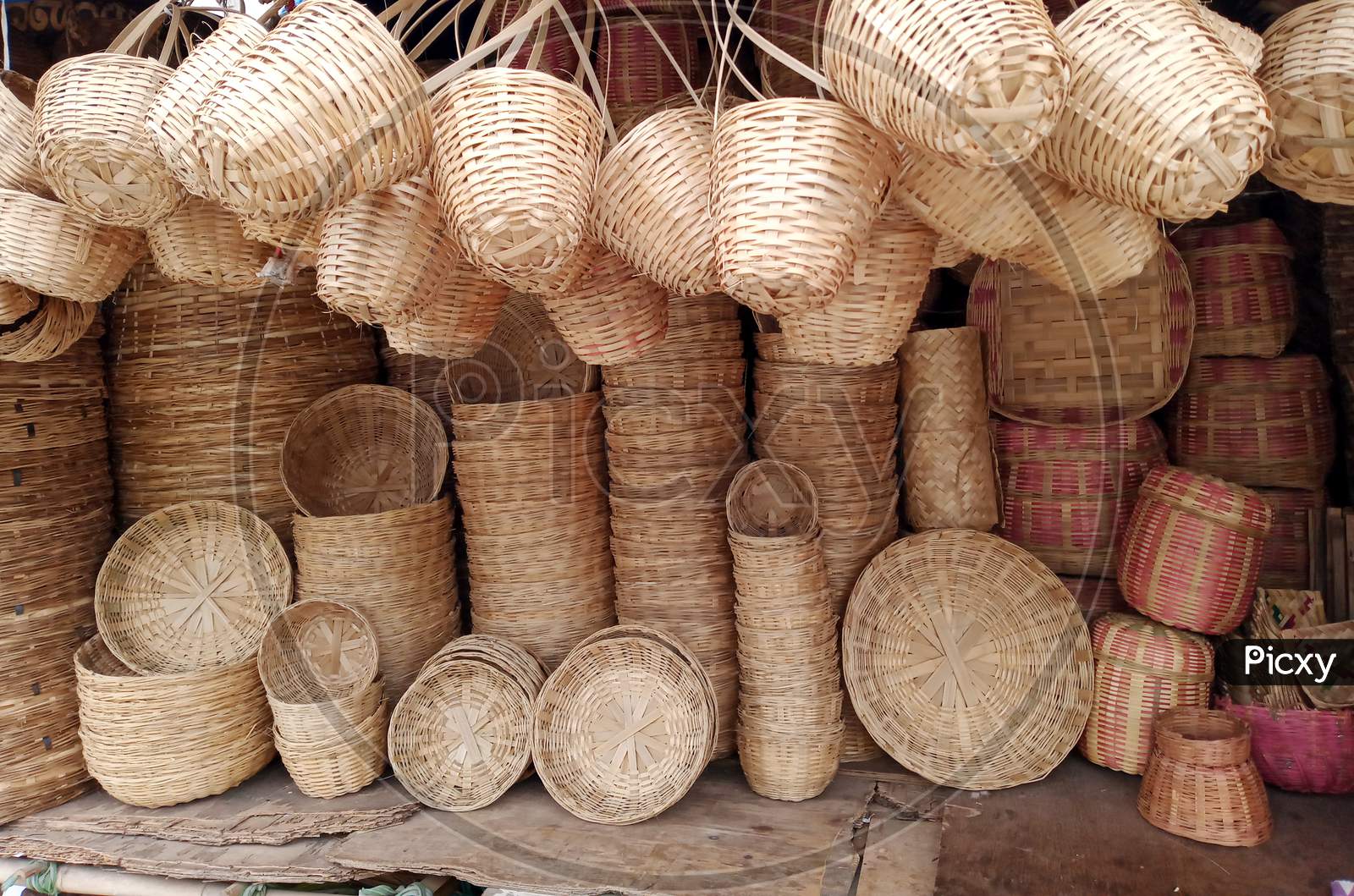 Cane baskets hand woven stacked in a road side market in Bengaluru/India.