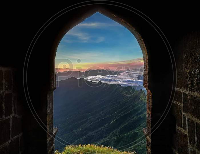 Beautiful view of mountain sky horizon from window of fort