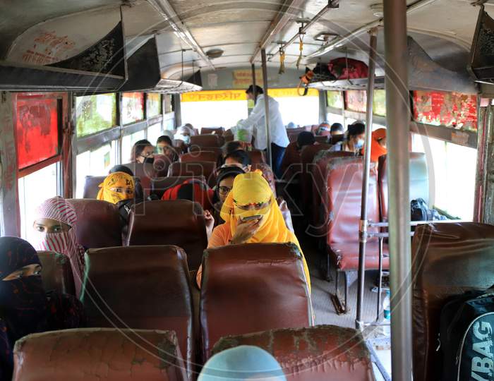 Students who had been stranded in the city for more than a month due to lockdown imposed to prevent the spread of Coronavirus board a specially scheduled bus to their respective hometowns, in Prayagraj on April 29, 2020.