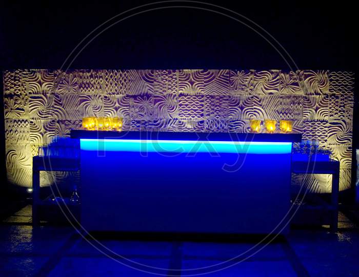 Bar Counter In a House Compound With Night Lights