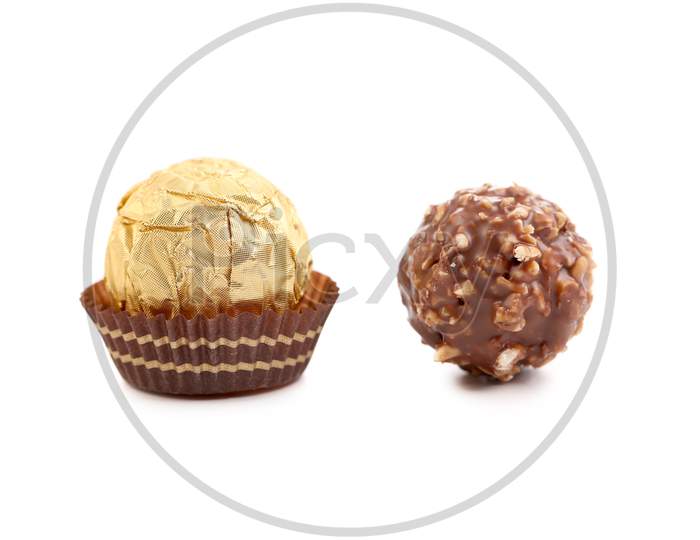 Two Chocolate Bonbons. Isolated On A White Background.