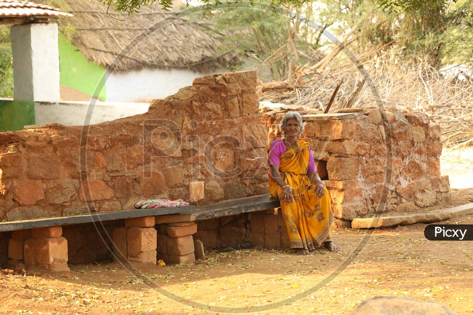 An Elderly Woman In an Rural Village