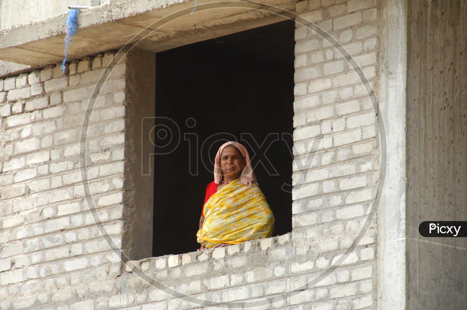Indian Woman  At a Construction Site