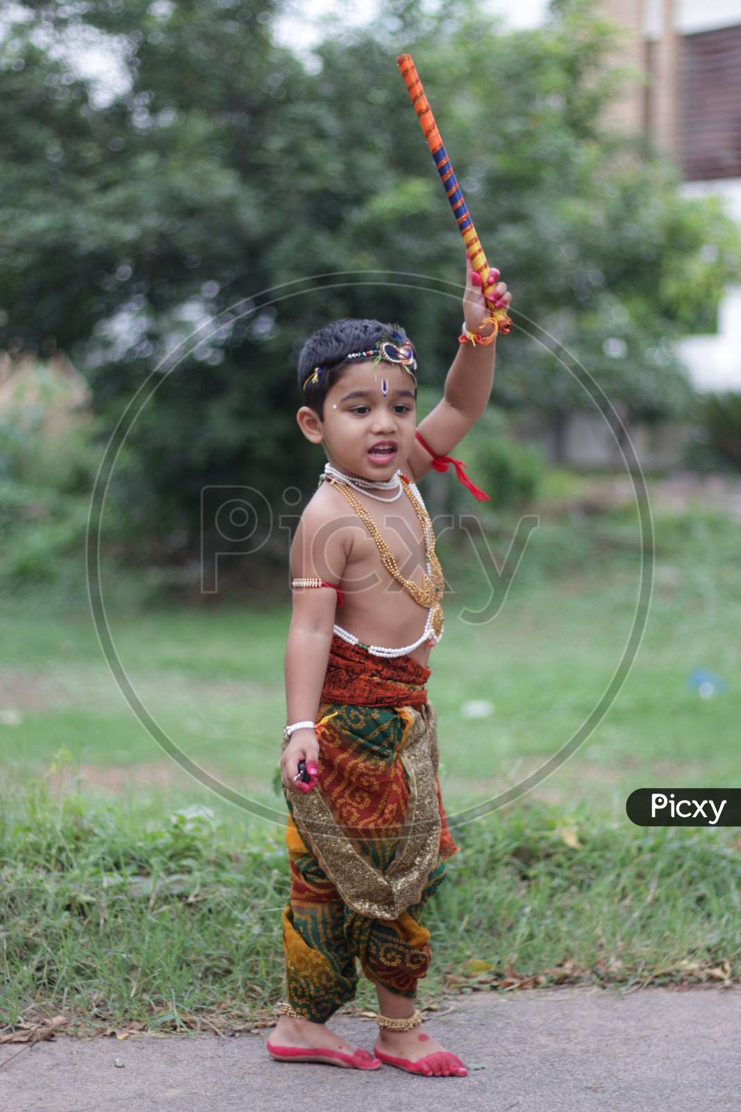 Image of indian kid as lord krishna.-GG616903-Picxy