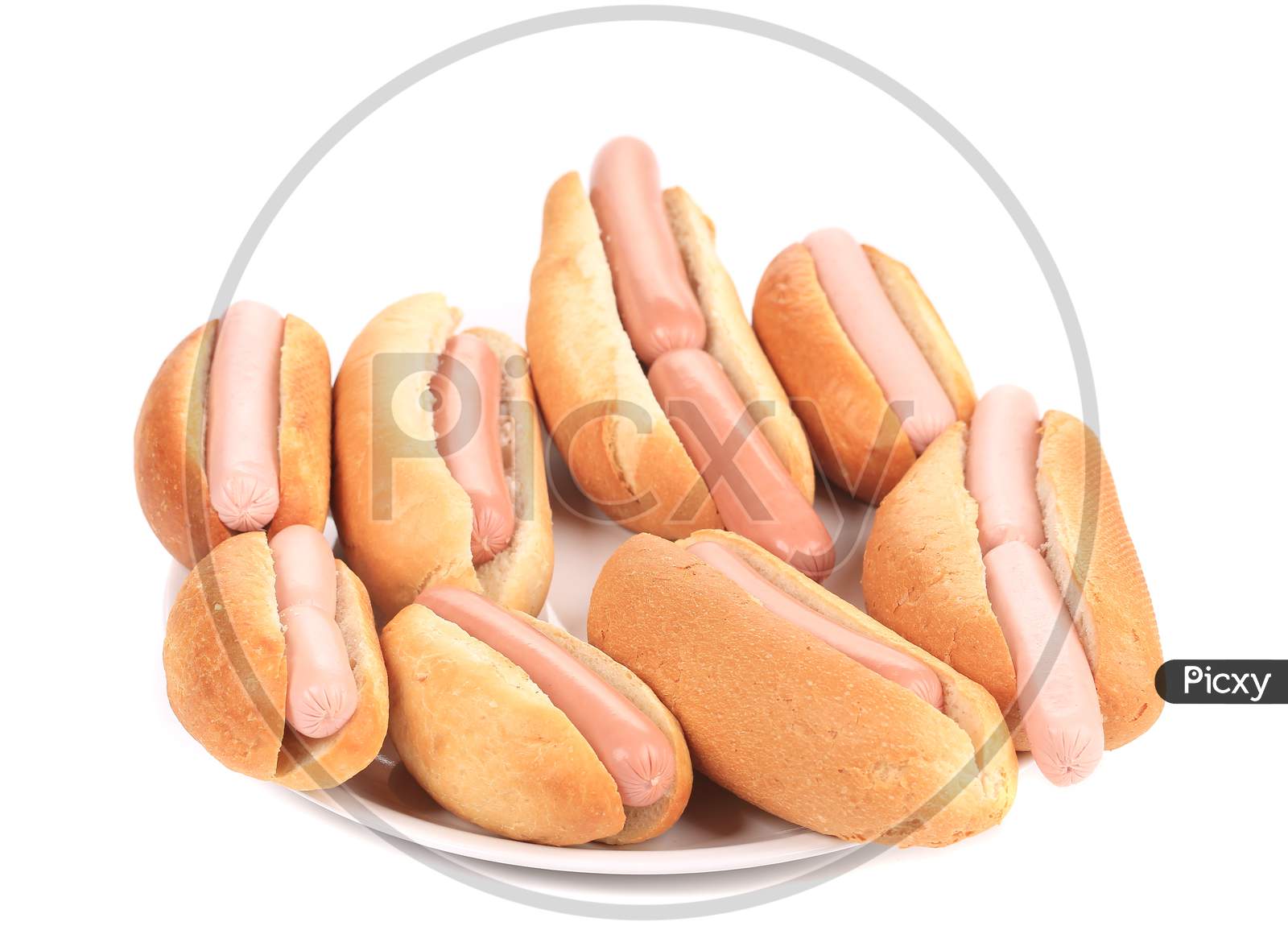 Bunch Of Hotdogs On Plate. Isolated On A White Background.