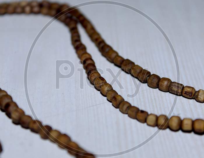Hindu Worship Bead Chain Tulasi Mala  on White Background