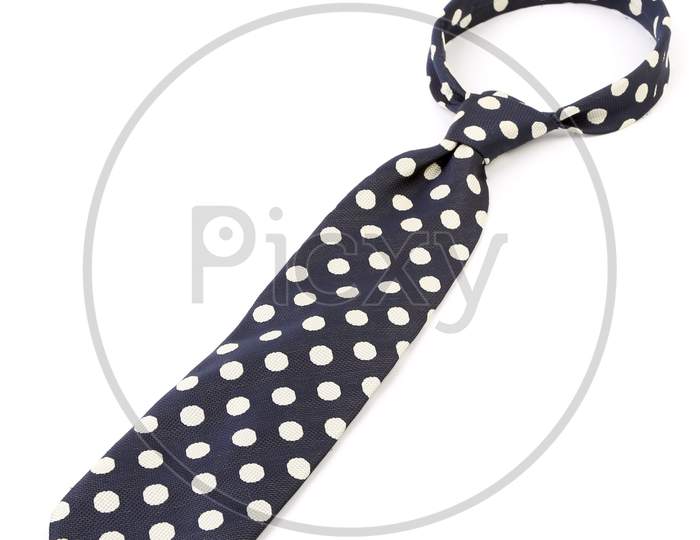 Polka Dot Necktie. Vertical. Isolated On A White Background.