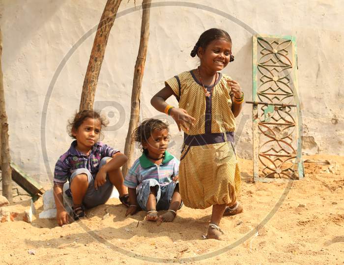 Poor Children in Rural Village Playing With Each other