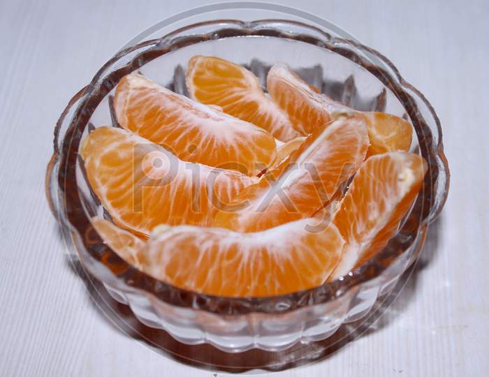 Orange Pieces in a Bowl