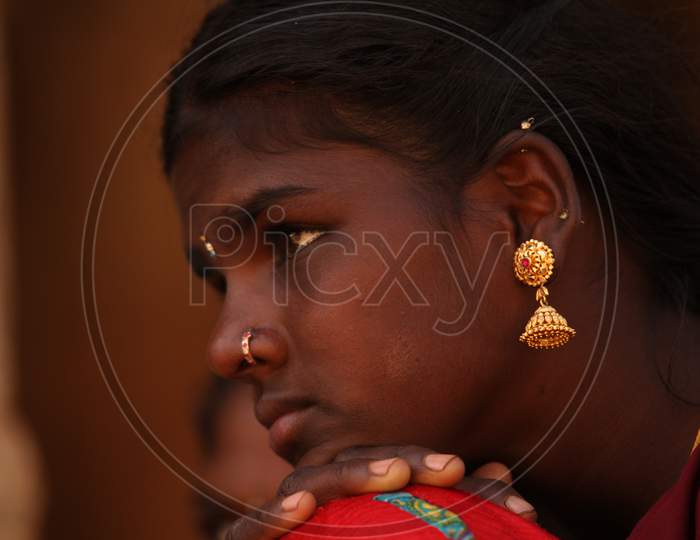Girl Child Face With an Expression in a Rural Village