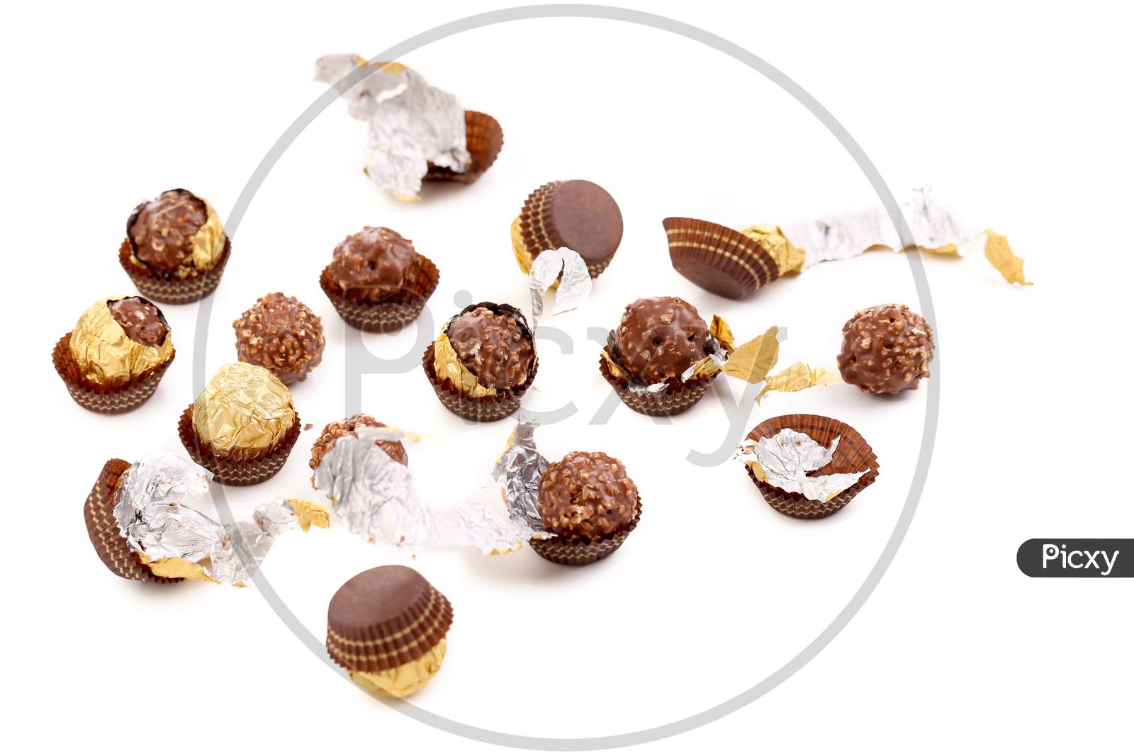 Bunch Of Round Chocolate Bonbons. Isolated On A White Background.