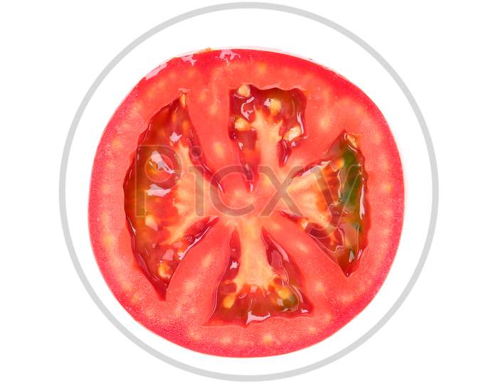 Close Up Of Tomato Slice. Isolated On A White Background.