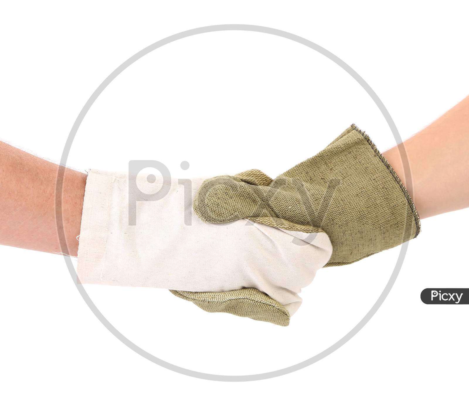 Two Hands Mittens In Hand Shake. Isolated On A White Background.