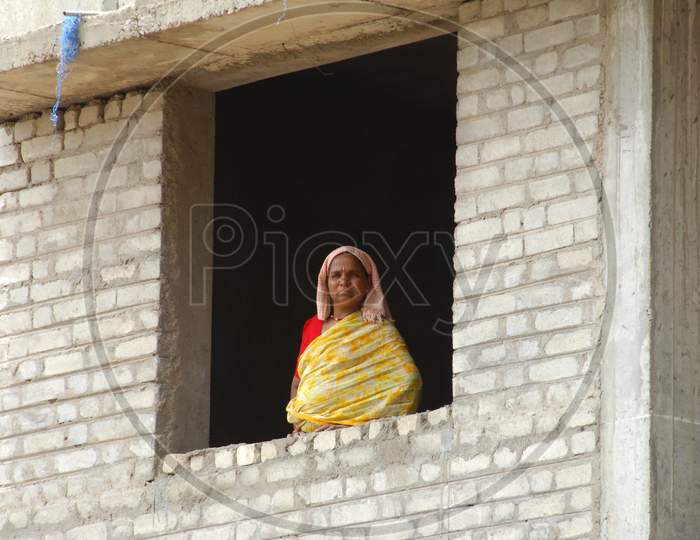 Indian Woman  At a Construction Site