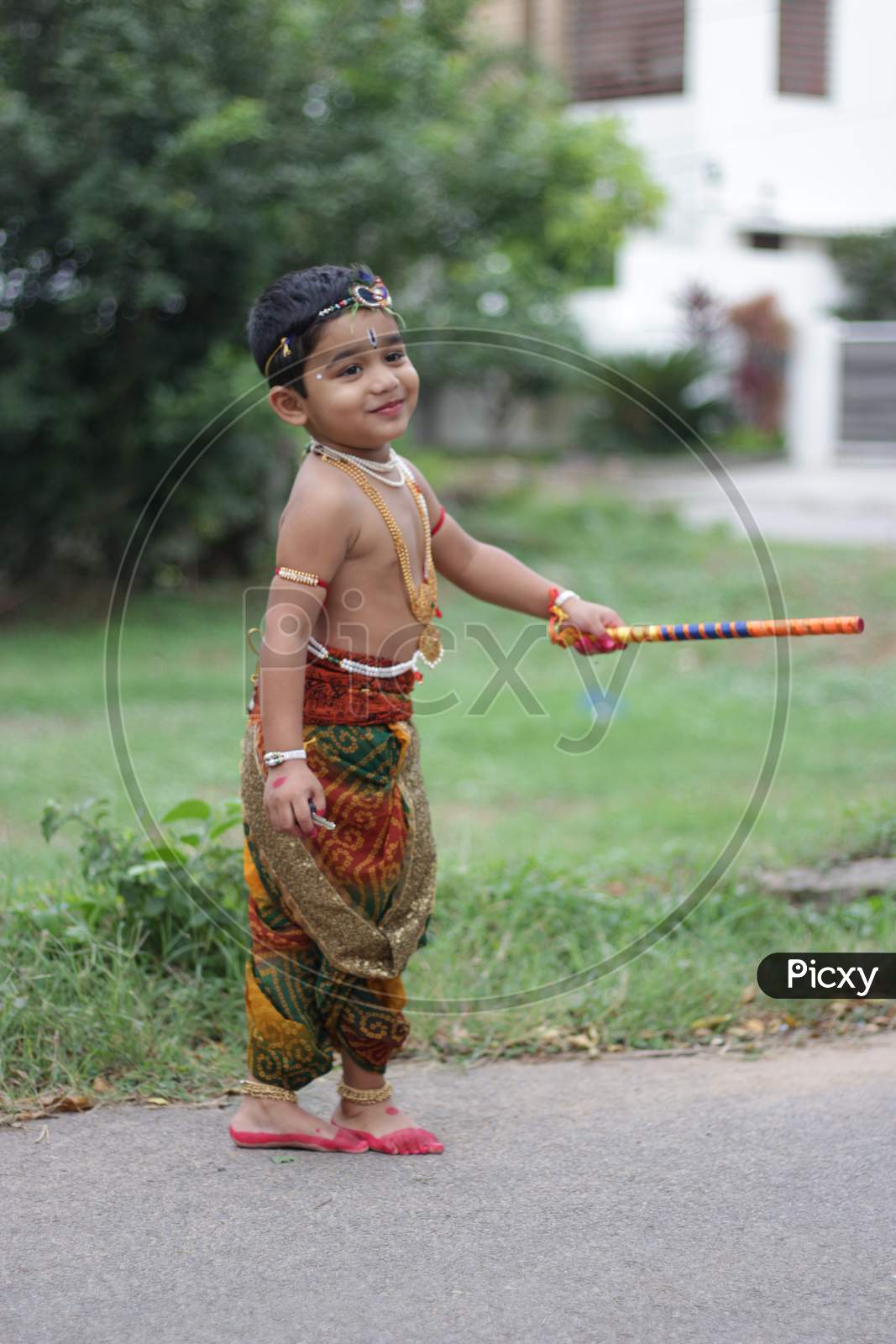 indian kid as lord krishna.