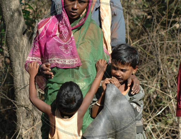 Image of Indian Poor Family With Mother Father and a Child-XI611492-Picxy