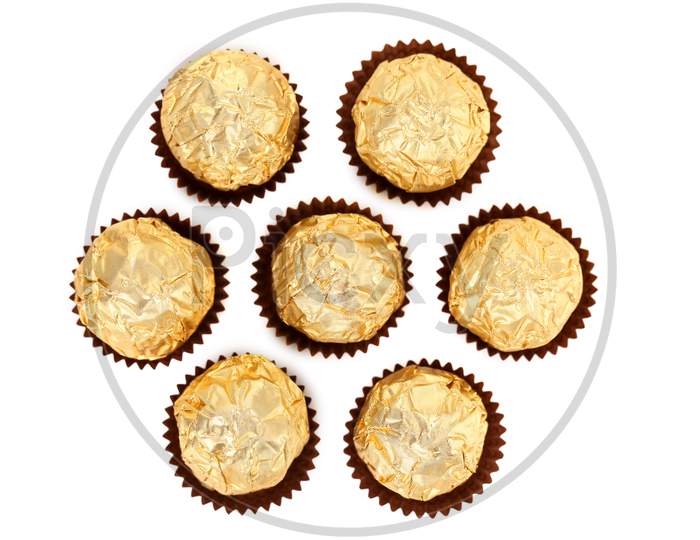 Bunch Of Round Chocolate Bonbons. Isolated On A White Background.
