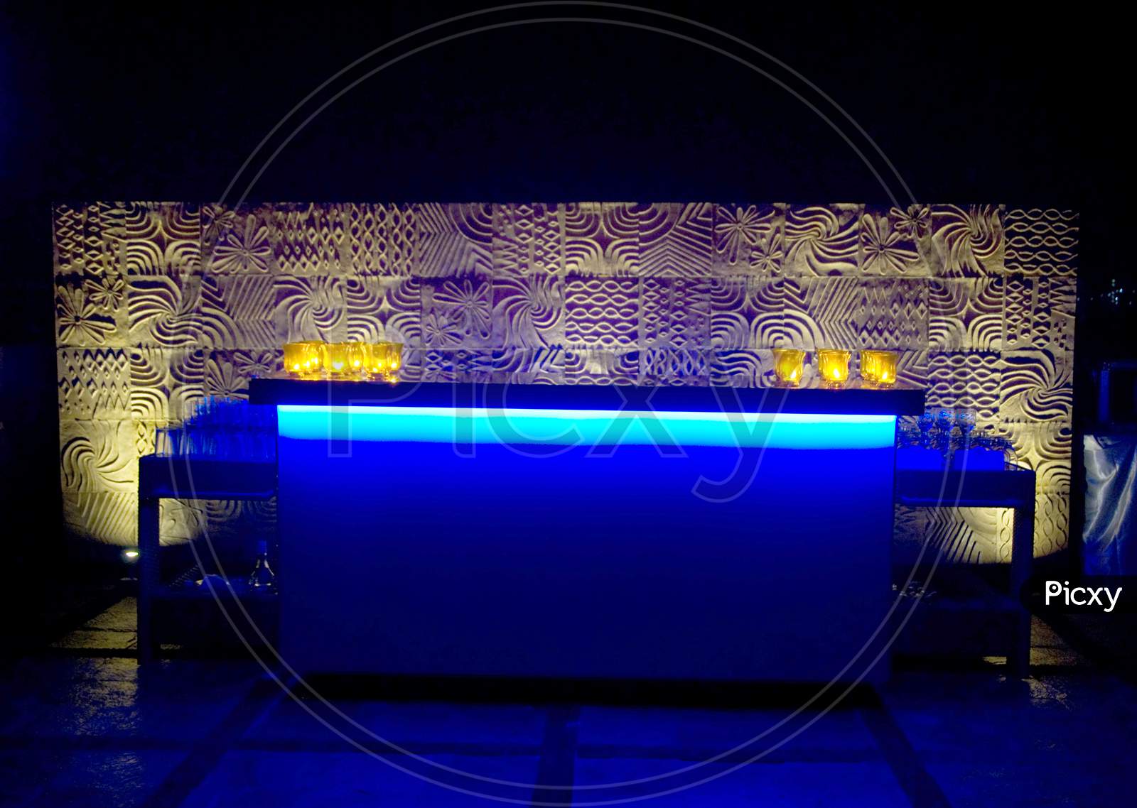 Bar Counter In a House Compound With Night Lights