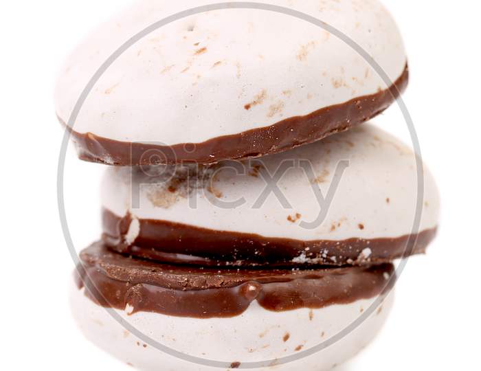 Stack Of Heart Shape Chocolate Meringues. Isolated On A White Background.