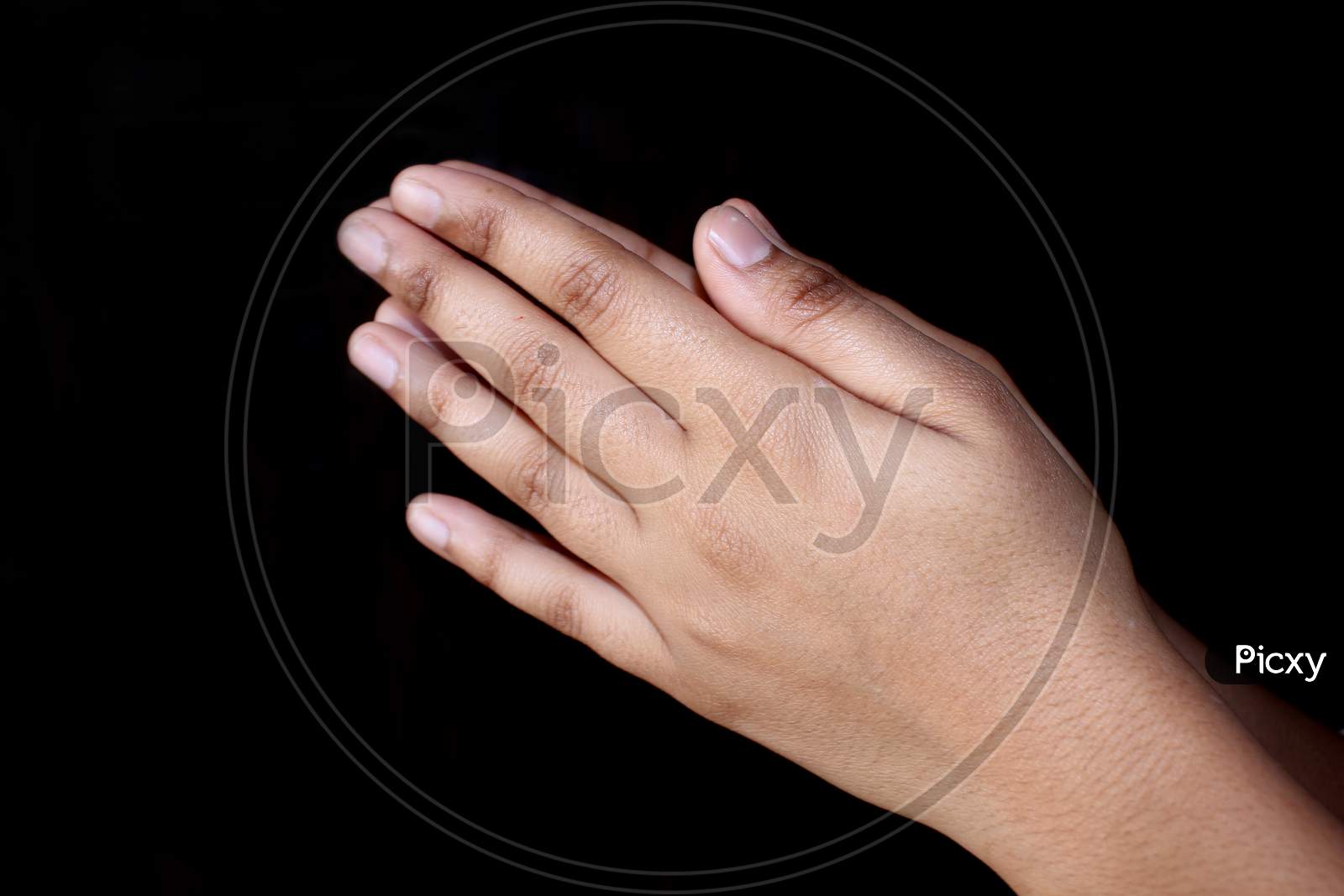 Close Up Both Of Hand Doing Prayer, Closed Hand, Symbol Of Request On Black Background