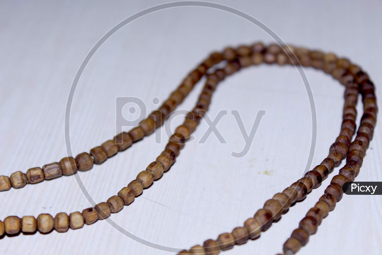 Hindu Worship Bead Chain Tulasi Mala  on White Background