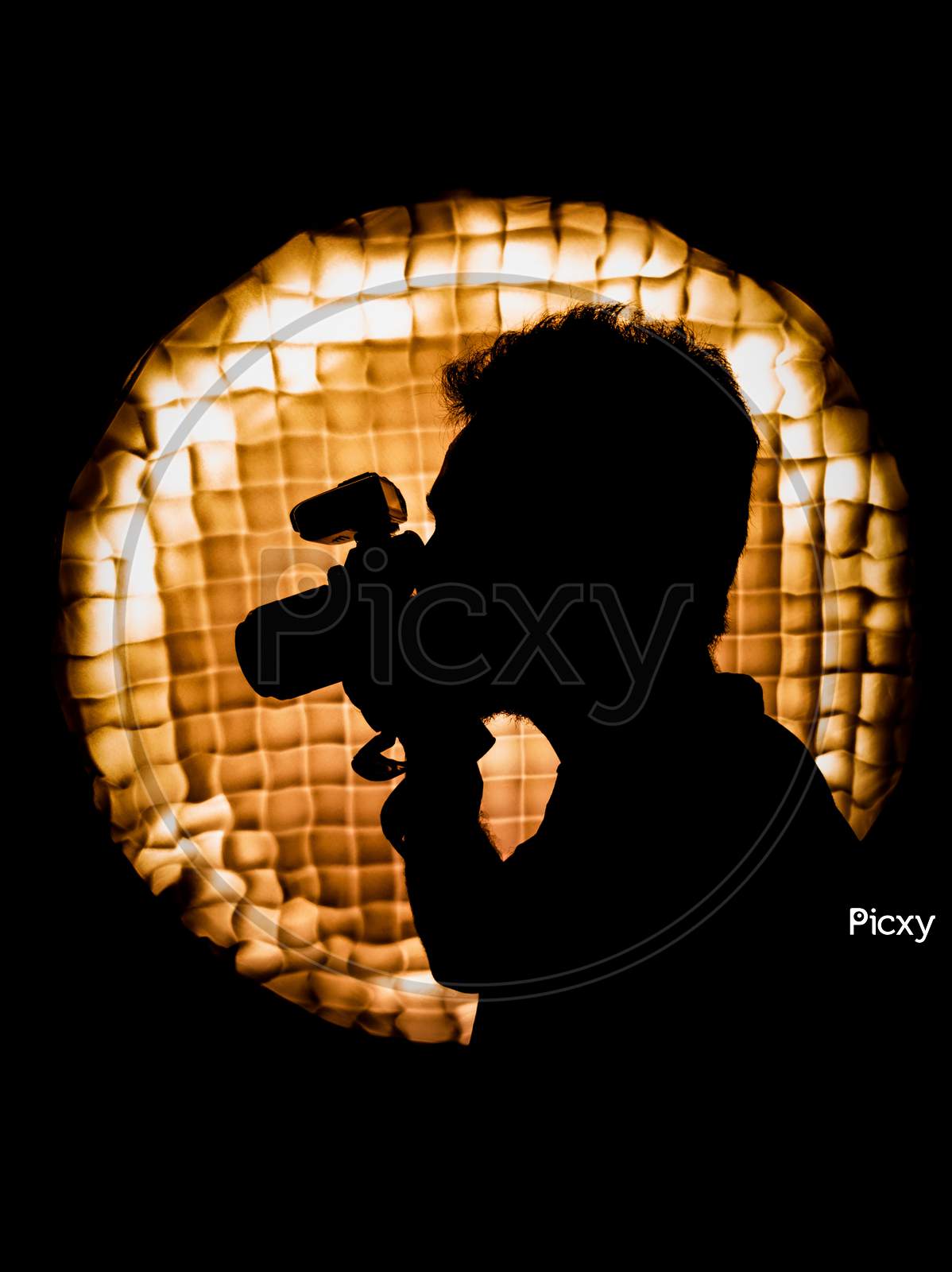 Low light picture of a photographer