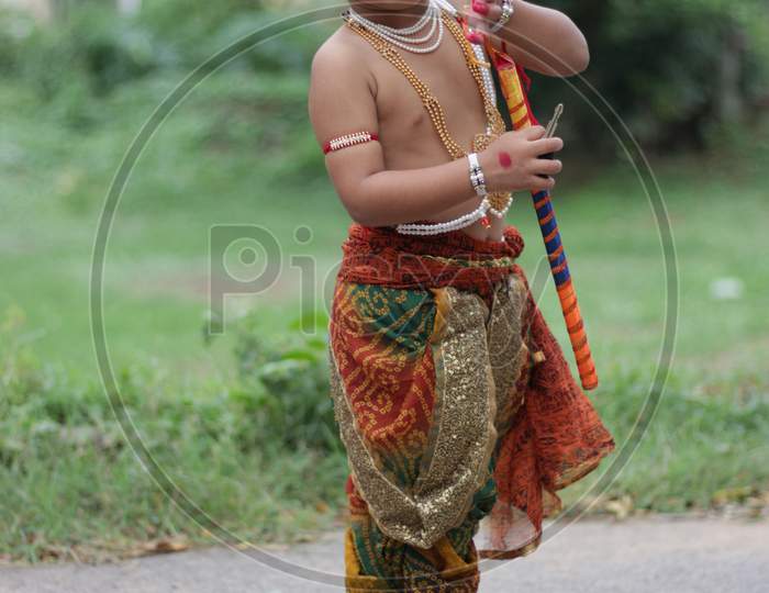 indian kid as lord krishna.