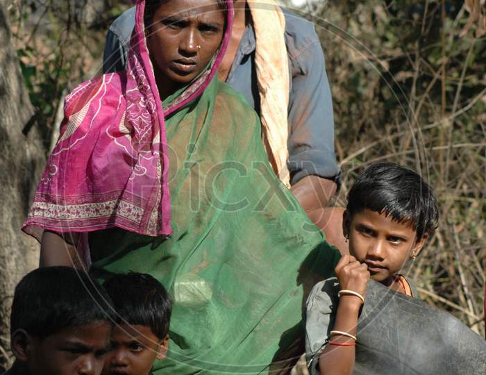 Indian Poor Family With Mother Father and a  Child