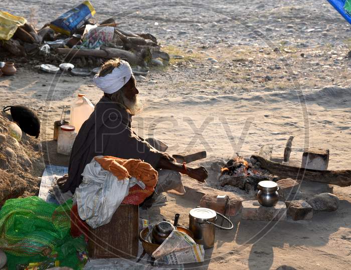 A Poor Elderly Man Living in a Road Side Tent