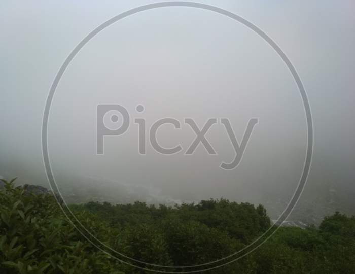 Landscape of Himachal Pradesh With Fog Clouds And Green Terrains