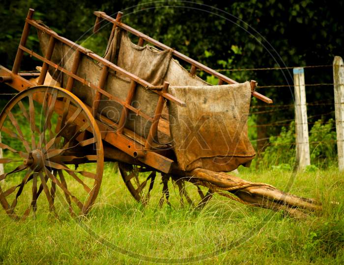 bailgadi - old farm cart with gunny sacks parked in a farm