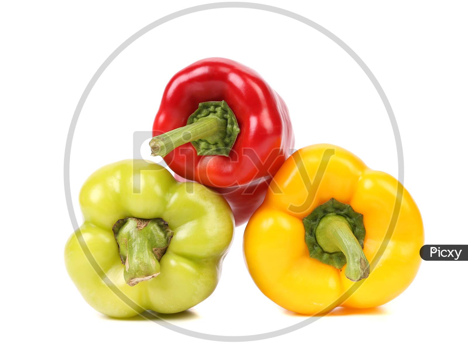 Three Colored Peppers. Isolated On A White Background.