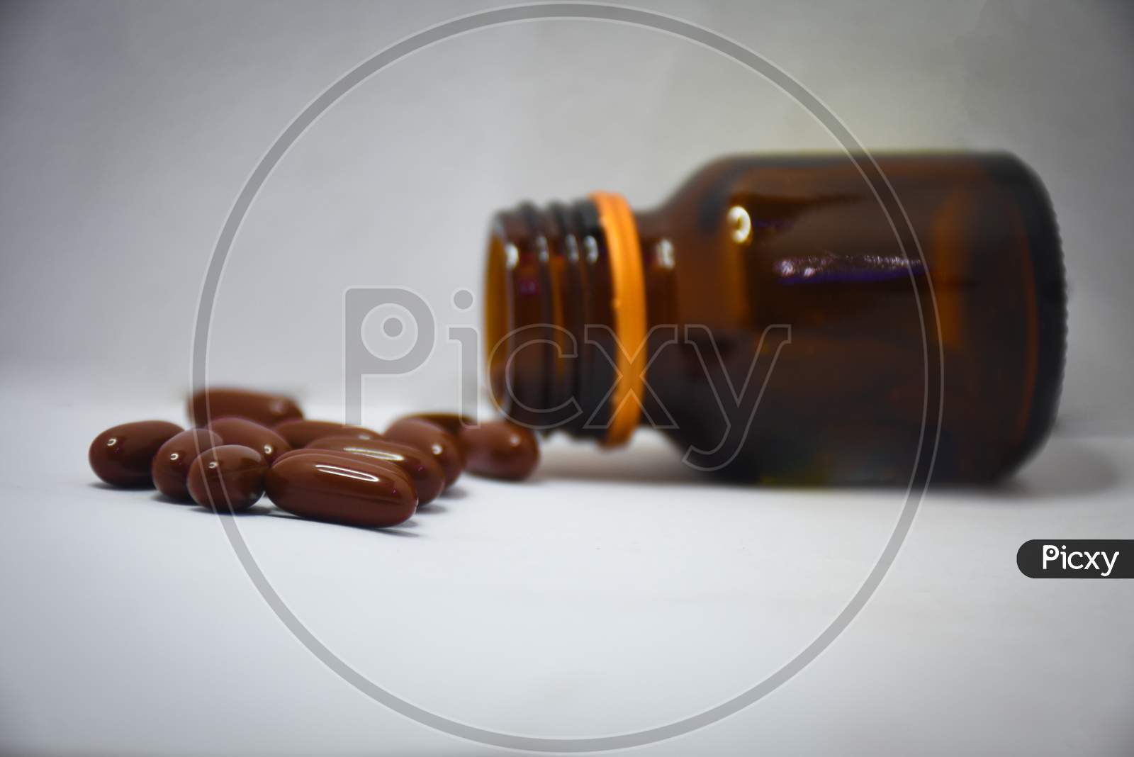 bottle of pills with white background
