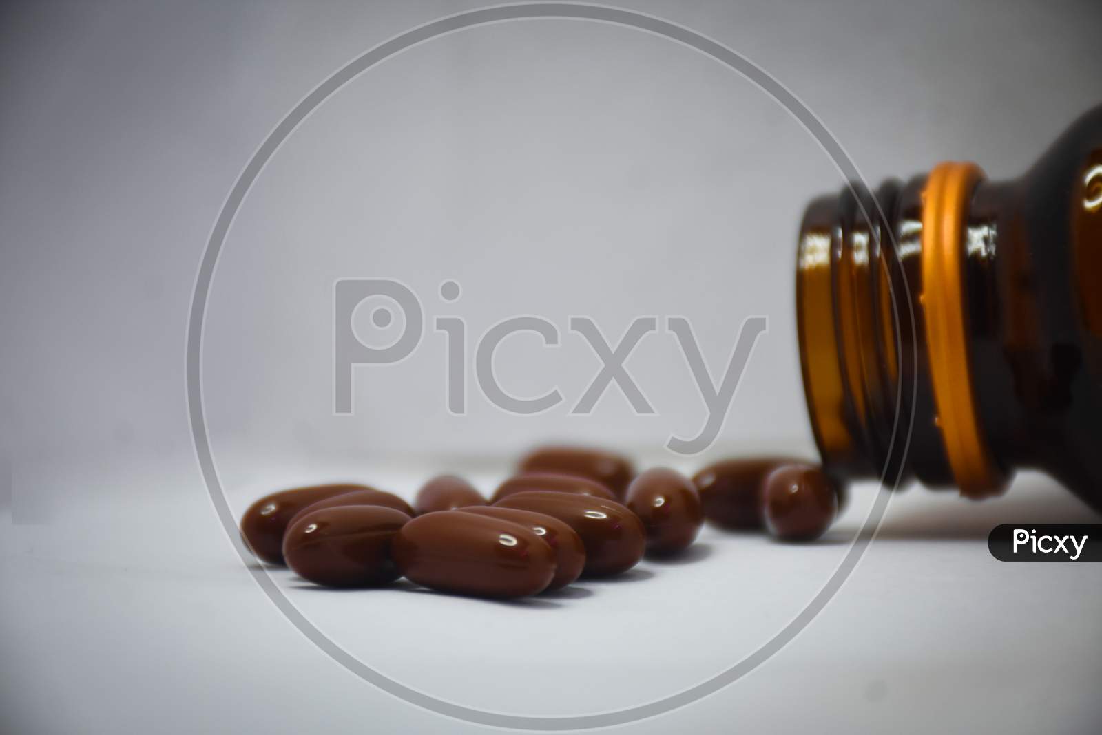 bottle of pills with white background